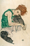 Sitzende Frau mit hochgezogenen © PGM, Deutschland
