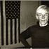Andy Warhol, Andy Warhol and American Flag, 1983, Unikat, Vintage Gelatine Silver Print, 20,3 x 25,4 cm, Courtesy Galerie Bruno Bischofberger, Zürich © The Andy Warhol Foundation for the Visual Arts, Inc., New York; VBK, Wien, 2013/14